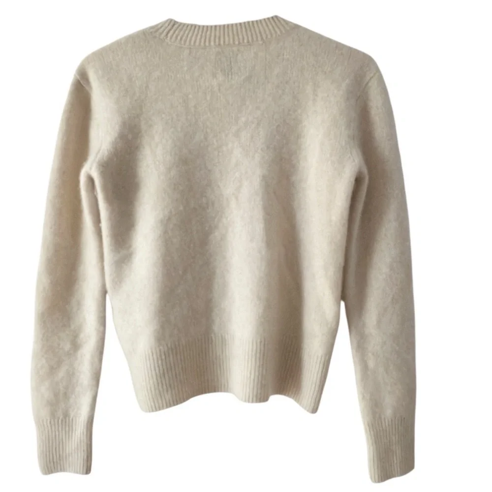 Joie soft cashmere sweater..a creamy pale beige shade. Women’s size Small